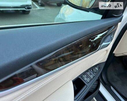 Білий БМВ Х5, об'ємом двигуна 2.98 л та пробігом 74 тис. км за 30900 $, фото 13 на Automoto.ua