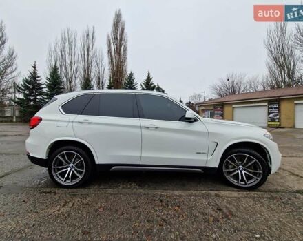 Білий БМВ Х5, об'ємом двигуна 3 л та пробігом 74 тис. км за 29500 $, фото 2 на Automoto.ua