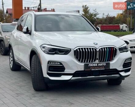 Белый БМВ Х5, объемом двигателя 3 л и пробегом 211 тыс. км за 37900 $, фото 2 на Automoto.ua