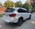 Білий БМВ Х5, об'ємом двигуна 3 л та пробігом 179 тис. км за 37200 $, фото 5 на Automoto.ua