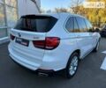 Білий БМВ Х5, об'ємом двигуна 2.98 л та пробігом 74 тис. км за 30900 $, фото 2 на Automoto.ua