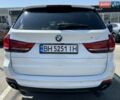 Белый БМВ Х5, объемом двигателя 2 л и пробегом 154 тыс. км за 32000 $, фото 1 на Automoto.ua