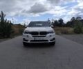 Белый БМВ Х5, объемом двигателя 3 л и пробегом 127 тыс. км за 25000 $, фото 1 на Automoto.ua