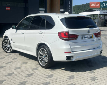 Белый БМВ Х5, объемом двигателя 3 л и пробегом 130 тыс. км за 40000 $, фото 1 на Automoto.ua