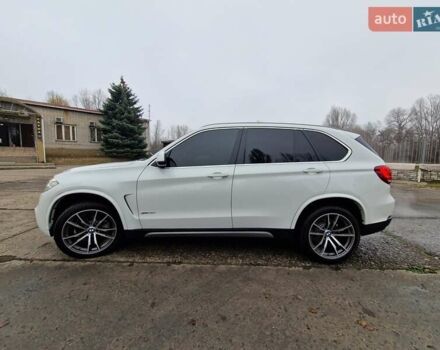 Білий БМВ Х5, об'ємом двигуна 3 л та пробігом 74 тис. км за 29500 $, фото 6 на Automoto.ua