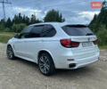 Белый БМВ Х5, объемом двигателя 3 л и пробегом 130 тыс. км за 40000 $, фото 1 на Automoto.ua