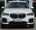 Белый БМВ Х5, объемом двигателя 2 л и пробегом 126 тыс. км за 42000 $, фото 1 на Automoto.ua