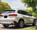 Білий БМВ Х5, об'ємом двигуна 3 л та пробігом 99 тис. км за 14000 $, фото 4 на Automoto.ua