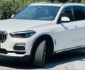 Белый БМВ Х5, объемом двигателя 3 л и пробегом 98 тыс. км за 49000 $, фото 1 на Automoto.ua