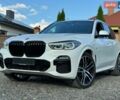Белый БМВ Х5, объемом двигателя 3 л и пробегом 148 тыс. км за 52700 $, фото 1 на Automoto.ua