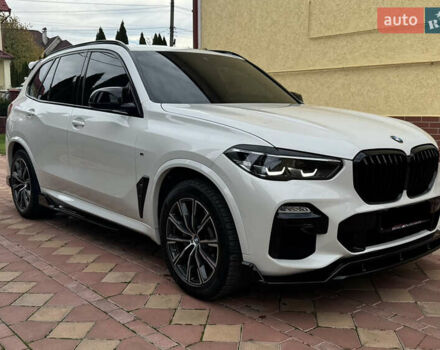 Белый БМВ Х5, объемом двигателя 3 л и пробегом 124 тыс. км за 49000 $, фото 1 на Automoto.ua