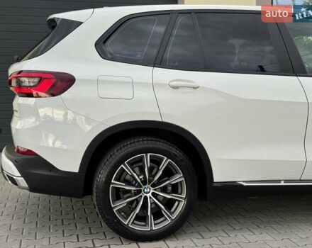 Білий БМВ Х5, об'ємом двигуна 2 л та пробігом 74 тис. км за 54200 $, фото 43 на Automoto.ua