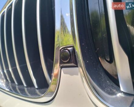 Белый БМВ Х5, объемом двигателя 2 л и пробегом 68 тыс. км за 53800 $, фото 3 на Automoto.ua