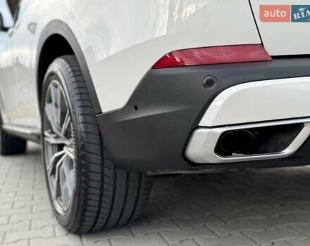 Білий БМВ Х5, об'ємом двигуна 2 л та пробігом 74 тис. км за 54200 $, фото 38 на Automoto.ua