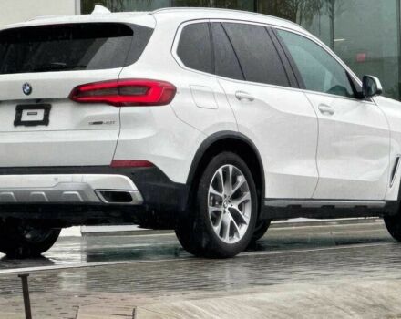 Белый БМВ Х5, объемом двигателя 3 л и пробегом 23 тыс. км за 25000 $, фото 4 на Automoto.ua