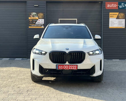 Белый БМВ Х5, объемом двигателя 3 л и пробегом 57 тыс. км за 95000 $, фото 1 на Automoto.ua