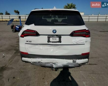 Белый БМВ Х5, объемом двигателя 3 л и пробегом 67 тыс. км за 25000 $, фото 5 на Automoto.ua