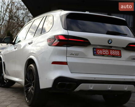 Білий БМВ Х5, об'ємом двигуна 3 л та пробігом 4 тис. км за 73899 $, фото 7 на Automoto.ua