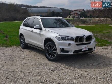 Белый БМВ Х5, объемом двигателя 3 л и пробегом 142 тыс. км за 23900 $, фото 1 на Automoto.ua