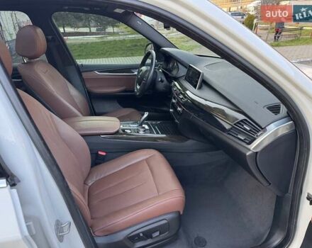 Белый БМВ Х5, объемом двигателя 3 л и пробегом 171 тыс. км за 26999 $, фото 1 на Automoto.ua