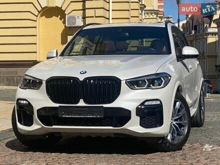 Белый БМВ Х5, объемом двигателя 3 л и пробегом 107 тыс. км за 54999 $, фото 1 на Automoto.ua