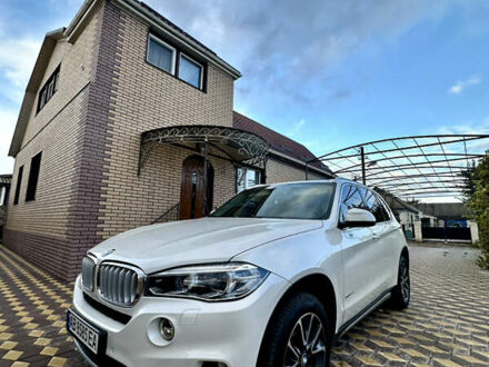 Белый БМВ Х5, объемом двигателя 2.98 л и пробегом 57 тыс. км за 28999 $, фото 1 на Automoto.ua