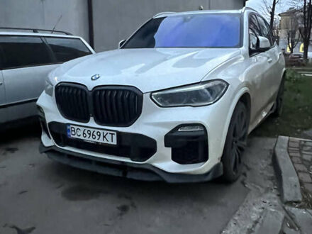 Белый БМВ Х5, объемом двигателя 3 л и пробегом 128 тыс. км за 52000 $, фото 1 на Automoto.ua