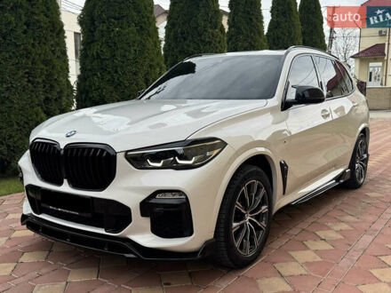 Белый БМВ Х5, объемом двигателя 3 л и пробегом 124 тыс. км за 49000 $, фото 1 на Automoto.ua