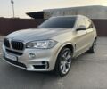 Бежевый БМВ Х5, объемом двигателя 3 л и пробегом 151 тыс. км за 31700 $, фото 1 на Automoto.ua