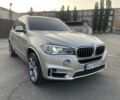 Бежевый БМВ Х5, объемом двигателя 3 л и пробегом 151 тыс. км за 31700 $, фото 1 на Automoto.ua