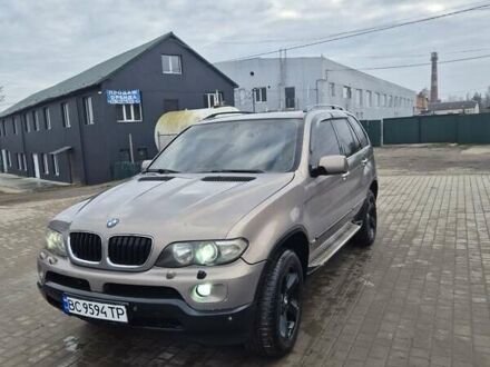 Бежевый БМВ Х5, объемом двигателя 2.99 л и пробегом 477 тыс. км за 10000 $, фото 1 на Automoto.ua
