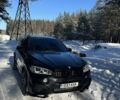 Черный БМВ Х5, объемом двигателя 3 л и пробегом 175 тыс. км за 28054 $, фото 1 на Automoto.ua