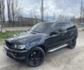 Черный БМВ Х5, объемом двигателя 4.4 л и пробегом 299 тыс. км за 8999 $, фото 1 на Automoto.ua