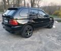 Чорний БМВ Х5, об'ємом двигуна 3 л та пробігом 310 тис. км за 12000 $, фото 1 на Automoto.ua