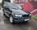 Черный БМВ Х5, объемом двигателя 3 л и пробегом 215 тыс. км за 4000 $, фото 1 на Automoto.ua