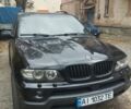 Черный БМВ Х5, объемом двигателя 4 л и пробегом 300 тыс. км за 4500 $, фото 1 на Automoto.ua
