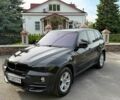 Чорний БМВ Х5, об'ємом двигуна 3 л та пробігом 236 тис. км за 14800 $, фото 1 на Automoto.ua