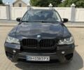 Черный БМВ Х5, объемом двигателя 3 л и пробегом 260 тыс. км за 15999 $, фото 1 на Automoto.ua