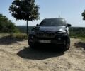 Черный БМВ Х5, объемом двигателя 3 л и пробегом 154 тыс. км за 23999 $, фото 1 на Automoto.ua