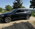 Черный БМВ Х5, объемом двигателя 3 л и пробегом 154 тыс. км за 23999 $, фото 1 на Automoto.ua