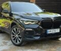Чорний БМВ Х5, об'ємом двигуна 2 л та пробігом 60 тис. км за 32176 $, фото 1 на Automoto.ua