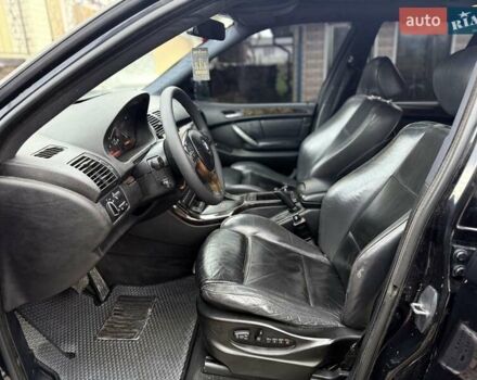 Черный БМВ Х5, объемом двигателя 4.4 л и пробегом 330 тыс. км за 6900 $, фото 26 на Automoto.ua