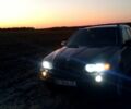 Черный БМВ Х5, объемом двигателя 3 л и пробегом 300 тыс. км за 7700 $, фото 1 на Automoto.ua