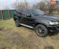 Черный БМВ Х5, объемом двигателя 3 л и пробегом 300 тыс. км за 6700 $, фото 1 на Automoto.ua
