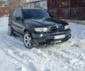 Черный БМВ Х5, объемом двигателя 4.4 л и пробегом 447 тыс. км за 8900 $, фото 1 на Automoto.ua