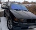 Черный БМВ Х5, объемом двигателя 3 л и пробегом 300 тыс. км за 6800 $, фото 1 на Automoto.ua