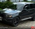 Черный БМВ Х5, объемом двигателя 4.4 л и пробегом 360 тыс. км за 8000 $, фото 1 на Automoto.ua