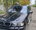 Черный БМВ Х5, объемом двигателя 3 л и пробегом 323 тыс. км за 9800 $, фото 1 на Automoto.ua