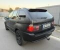Чорний БМВ Х5, об'ємом двигуна 3 л та пробігом 150 тис. км за 3900 $, фото 4 на Automoto.ua