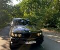 Черный БМВ Х5, объемом двигателя 4.4 л и пробегом 400 тыс. км за 8300 $, фото 1 на Automoto.ua